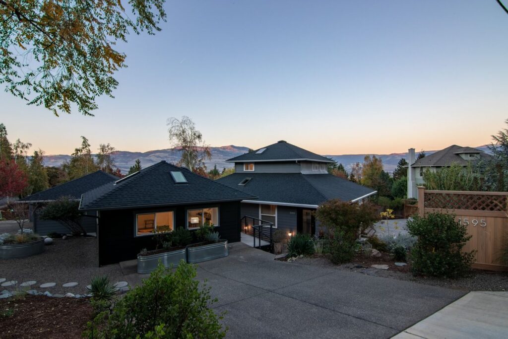 Modern home with a durable dark roof in Highland, Utah