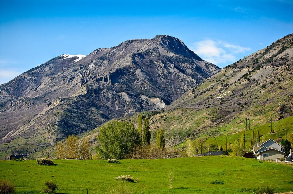 Green valley below the Wasatch mountains near Lindon, Utah