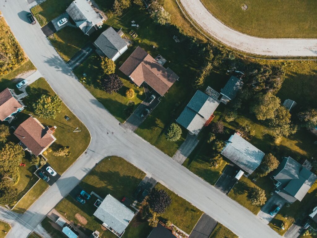 Aerial view of a Murray, Utah neighborhood with new shingle roofs