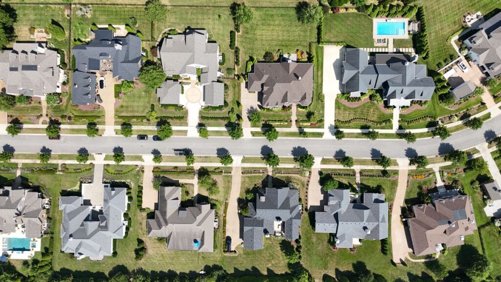 Aerial view of an upscale Orem-area neighborhood with new architectural shingle roofs