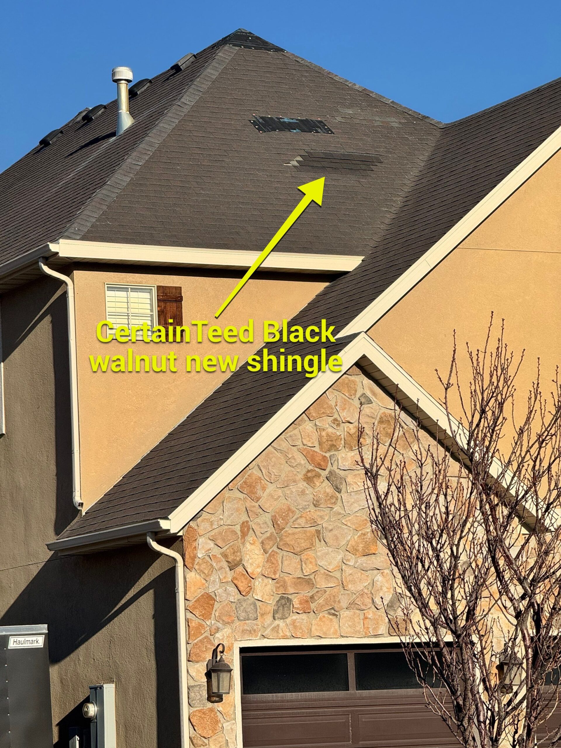 Annotated Rooval photo: wind-damaged area with new replacement shingle on a Utah County roof