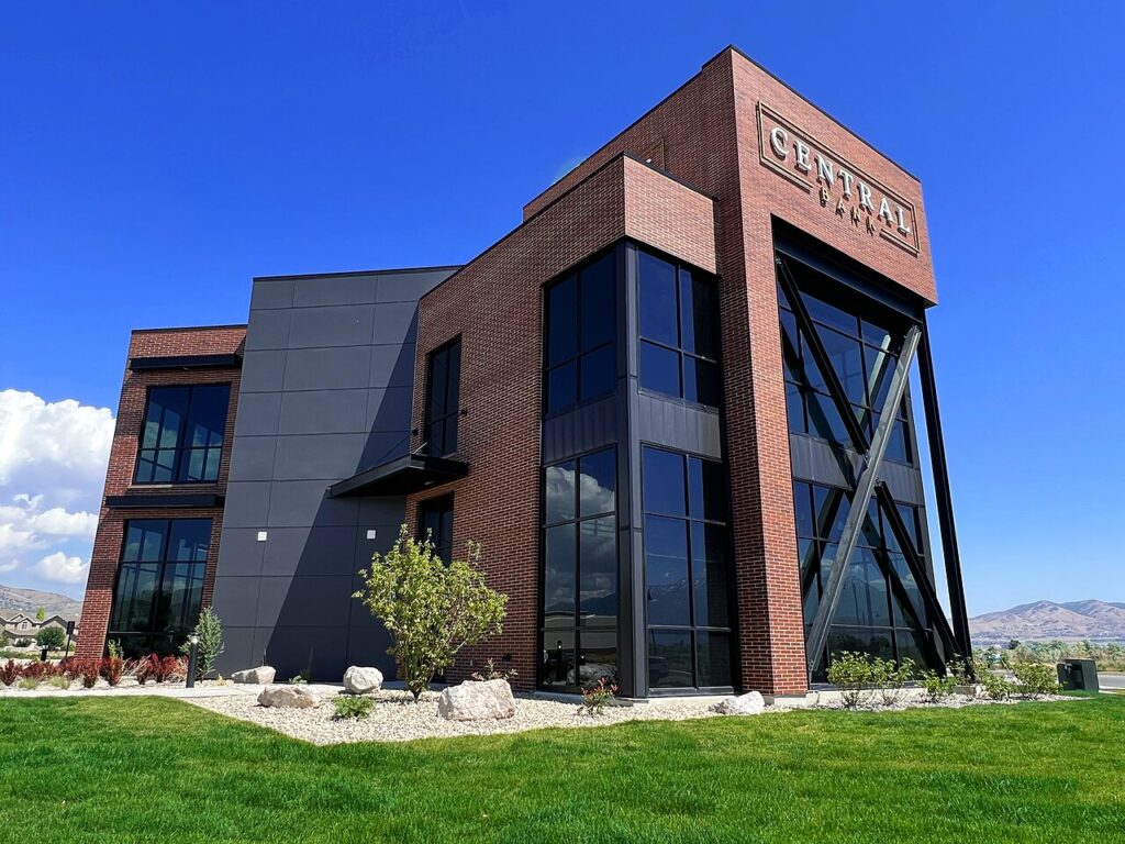 Modern Central Bank building in Saratoga Springs, Utah under a blue sky