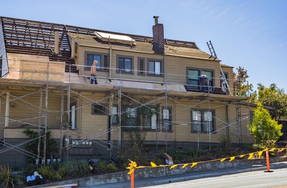 Roof replacement in progress on a Saratoga Springs, Utah home