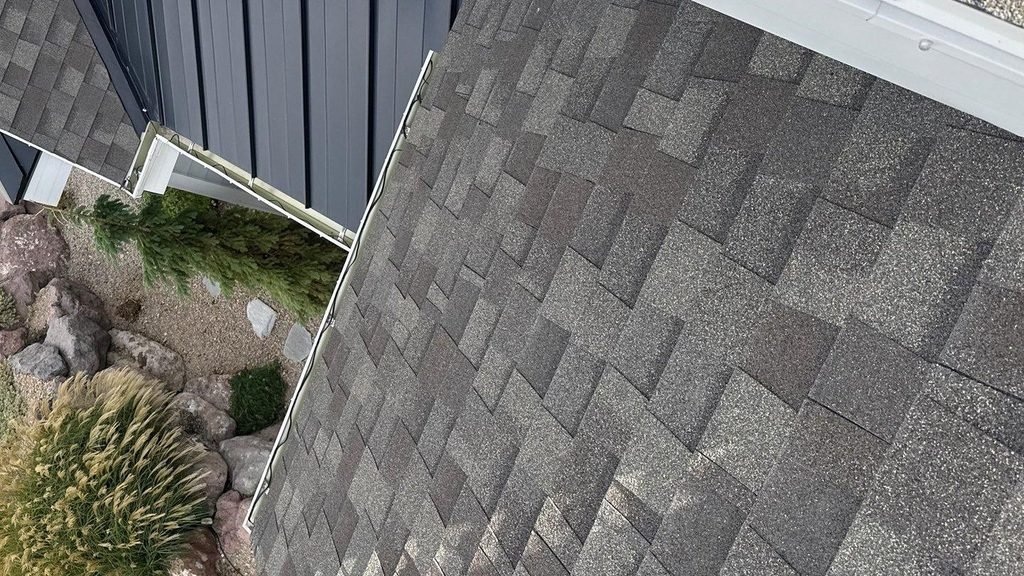 Architectural asphalt shingles with staggered, layered tabs on a Lehi, Utah roof