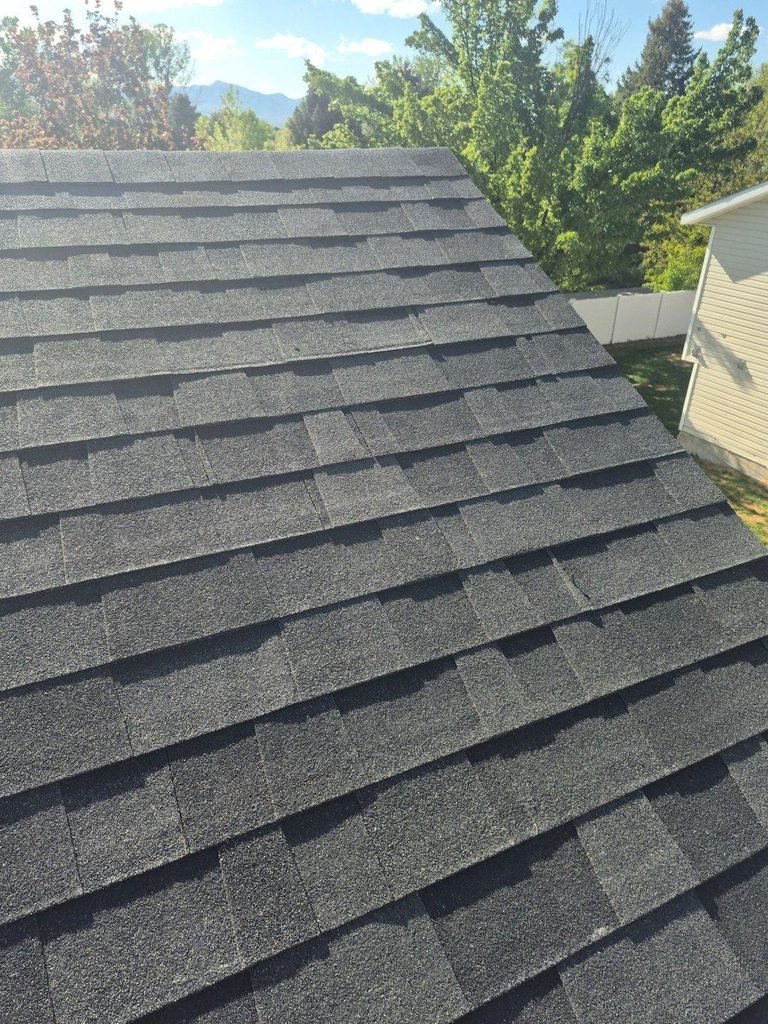 New architectural asphalt shingle roof after a full roof replacement